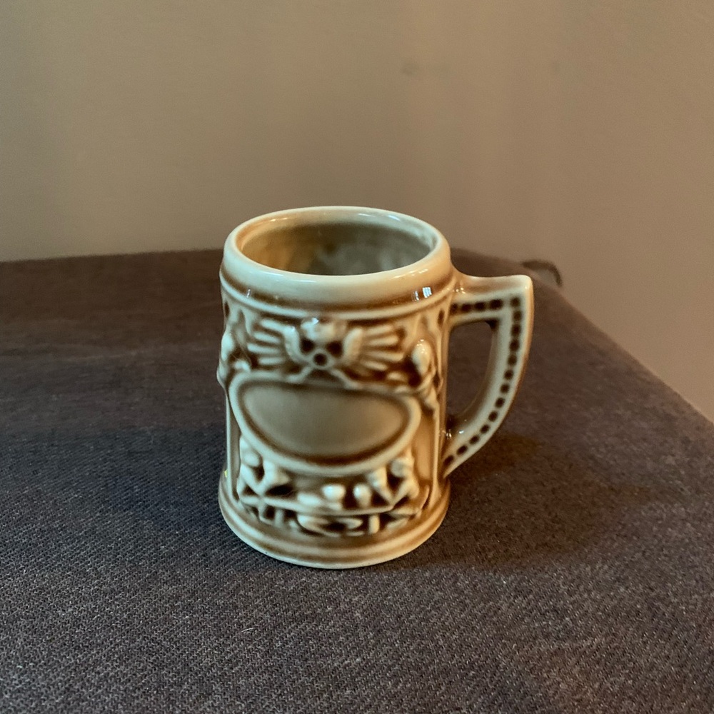 Vintage Ceramic Mug with Intricate Design